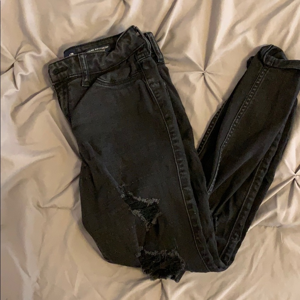 High rise black ripped jeans